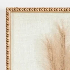 Wall Plaques-Kirkland's Home Faux Pampas Grass Beaded Frame Wall Plaque Tan