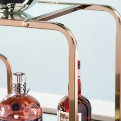 Kitchen Islands & Bar Carts-Kirkland's Home Gold Curved Metal Mirrored Bar Cart