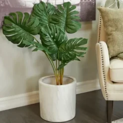 Trees & Topiaries-Kirkland's Home Monstera Plant In Ribbed Rock Planter