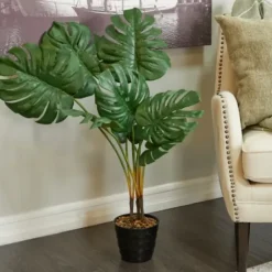Trees & Topiaries-Kirkland's Home Monstera Plant In Ribbed Rock Planter